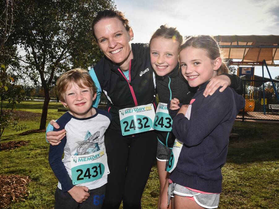 PROUD: Leah Wiseman of Albury ran with her children Rafferty, 6, Isla, 10, and Sadie, 8, and shared with them stories of their grandmother and grandfather. 