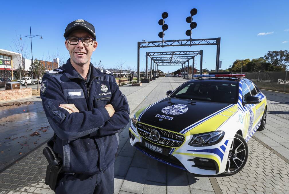 NEW WHEELS: Leading Senior Constable David Young and the highway patrol team will drive the Mercedes E43 AMG on loan to Victoria Police. Picture: JAMES WILTSHIRE