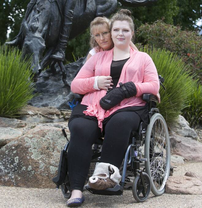 TAKING ITS TOLL: Emily Hewatt, pictured with her mum Alison, is raising money to get to Australia for life-changing treatment for her rare condition, which causes excruciating pain.  Picture: ELENOR TEDENBORG