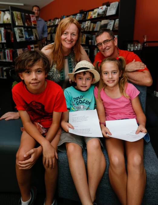 SHARP MINDS: Marisa Quigley and Paddy Dewan hold a workshop for young writers like Elijah French, 11, Jude French, 6, and Lily French, 9, of Howlong.