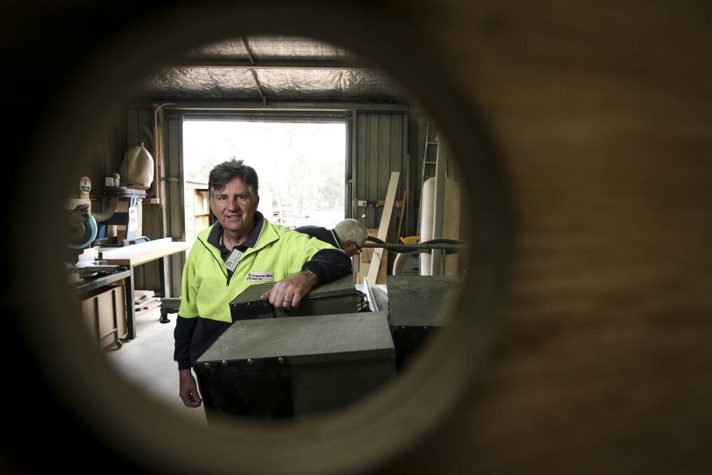 RIGHT FIT: Thurgoona Men's Shed president Bruce Dyce has helped design a solar-powered camera nest box with the Albury Conservation Company. 15 have been installed to monitor squirrel gliders. Pictures: JAMES WILTSHIRE