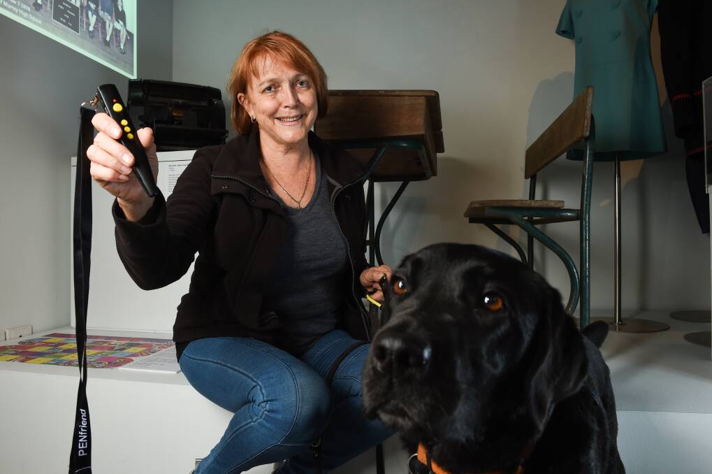 NEW: Ilonka Trost at the LibraryMuseum with guide dog Zoe to test out technology giving blind people access to displays. Picture: MARK JESSER
