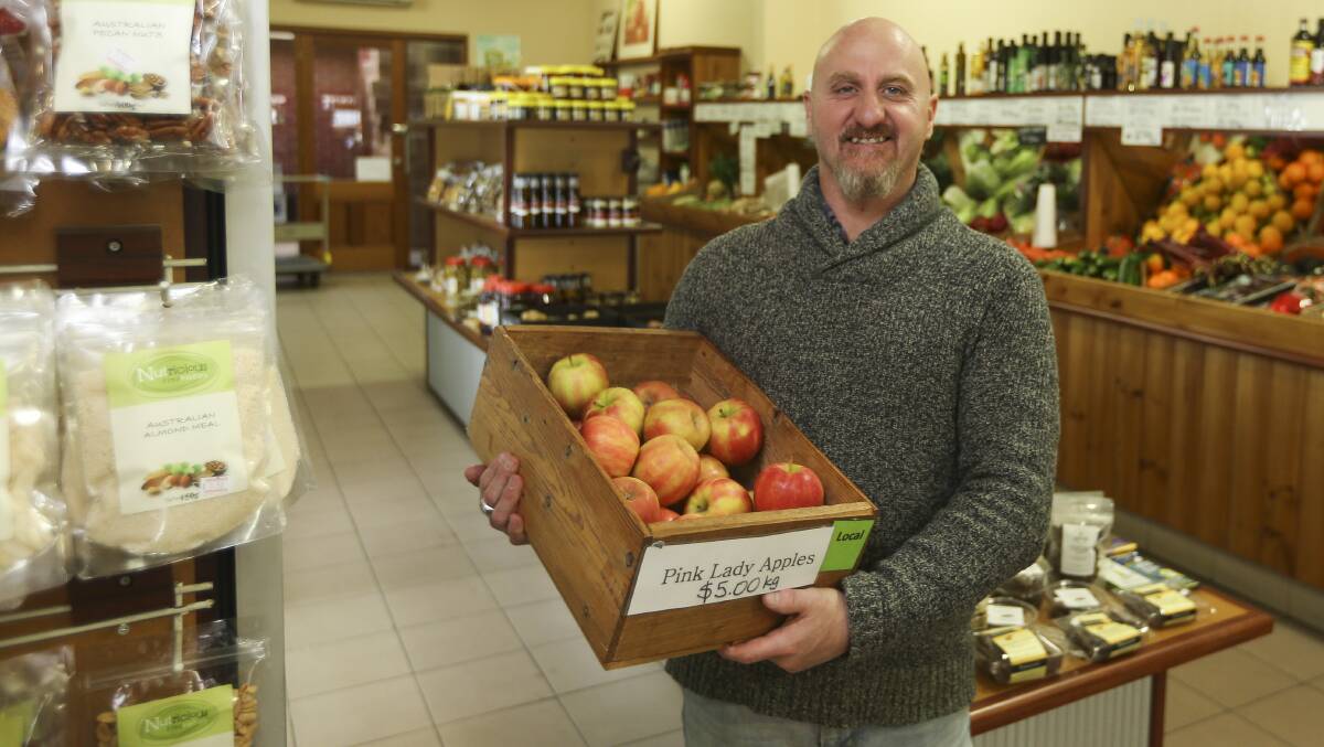 Wayne Borschman from the town's Green Grocer was among the business owners who provided produce when there was no supermarket. Picture: ELENOR TEDENBORG