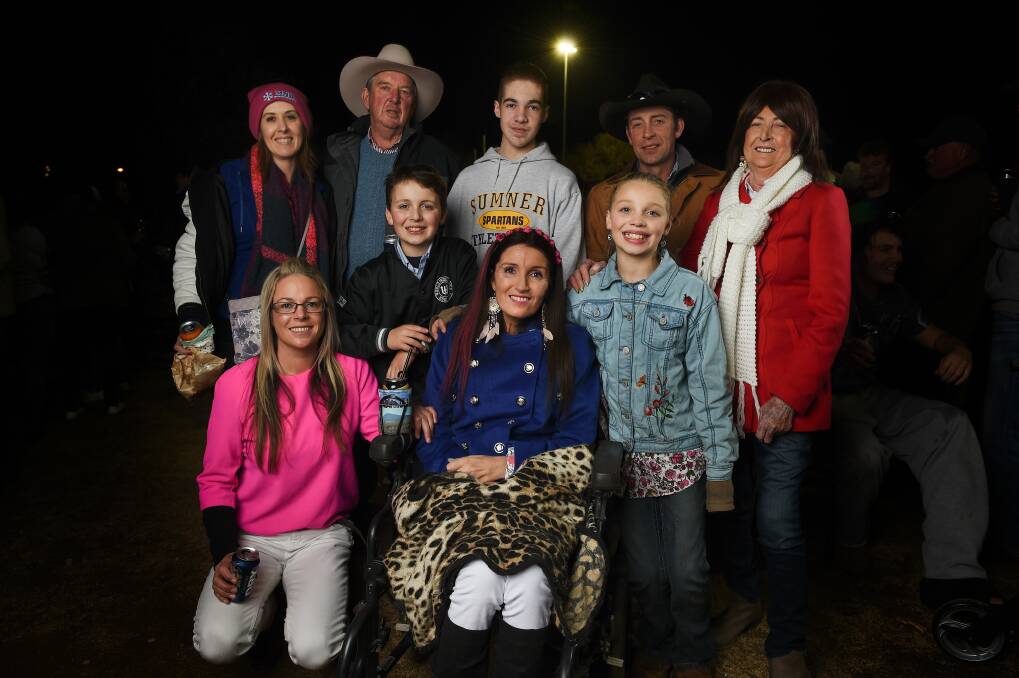 TOGETHER: Tahnee with her family - (front) sister Aleisha, son Dallas and daughter Bonnie, and (behind) sister Christie, father Jock, nephew Dylan, husband Craig and mum Barbara, at the Omeo event dedicated to Tahnee and those who have fought MND. Picture: MARK JESSER
