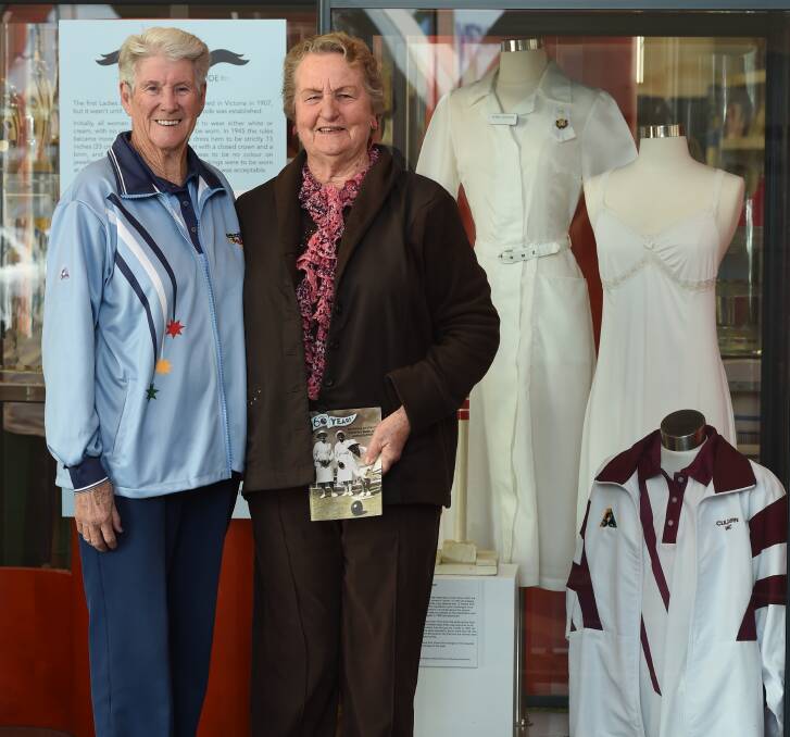 HISTORY: Verna Gherashe and Marjorie Winnett at the Albury display celebrating 60 years of women's bowling in the Riverina. Picture: MARK JESSER