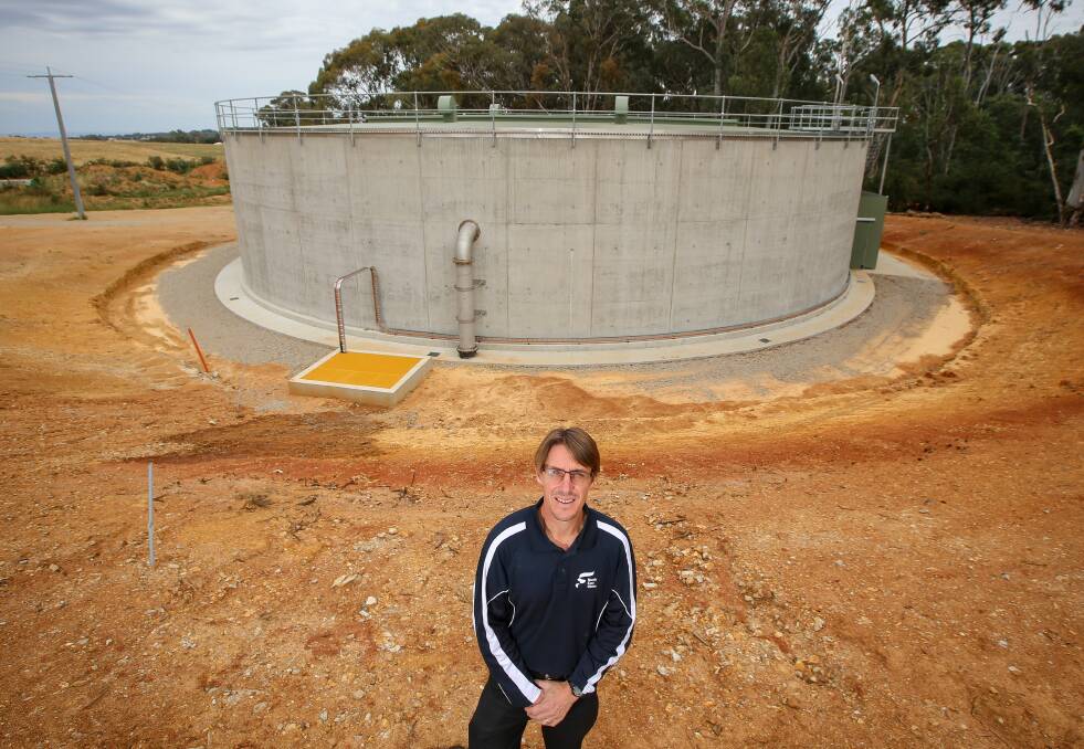 HUGE: North East Water planning and infrastructure executive Kevin Freeman says a new $1.9 million tank at Beechworth doubles water storage capacity, meeting peak day demand for 30 years. Picture: JAMES WILTSHIRE