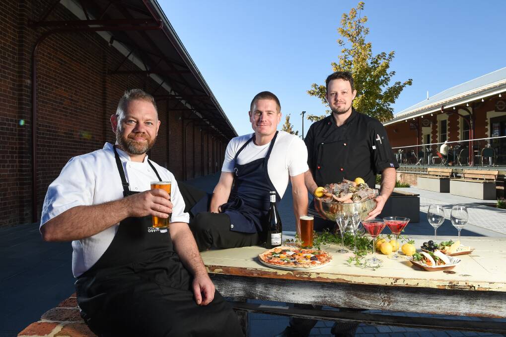 CELEBRATION: The Goods Shed Craft Beer Cafe, Miss Amelie and BeanStation head chefs Alex Dawkins, David Kapay and Casey Durham will put on a show this Friday to celebrate the Promenade's first anniversary. Picture: MARK JESSER