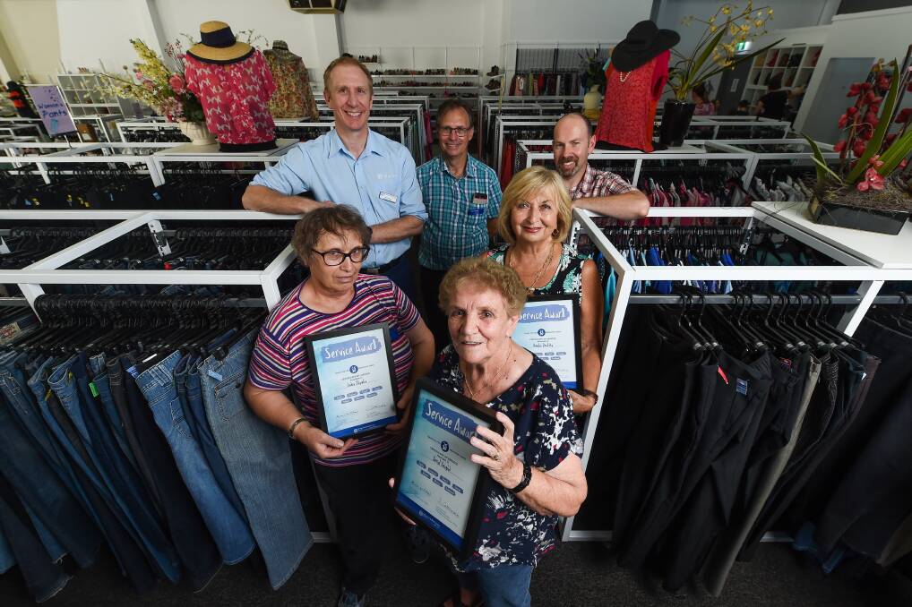 LONG STINT: Luba Slywka, Beryl Knight and Amilia Dealtry have each been recognised for 35 years of service to St Vincent de Paul Society Wodonga. Picture: MARK JESSER