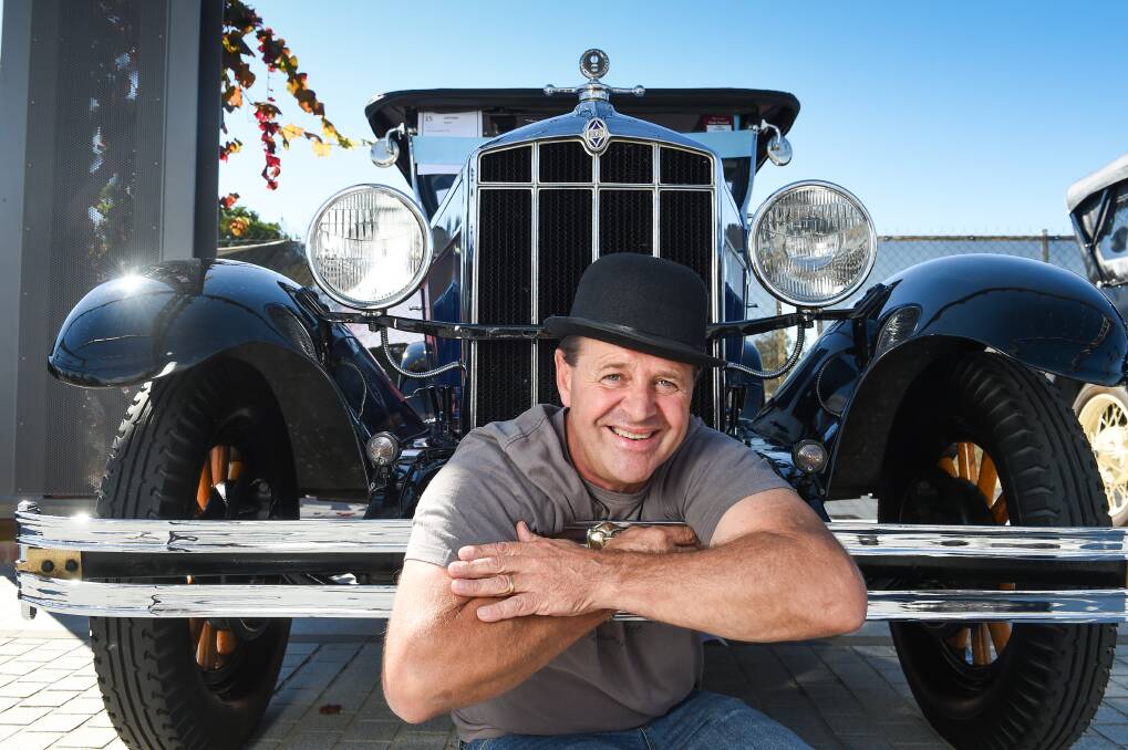 SHINING: Chris Gay of Wodonga, with his 1928 Rugby Tourer, one of 40 vintage and veteran cars on display at the RACV Antique Wheels of Yesteryear. Picture: MARK JESSER