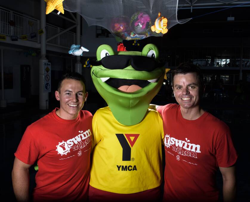 TAKE A DIVE: YMCA's Matt Frost and Ryan McNamara with Philbert the Frog prepare for the 2017 YMCA Swimathon, aiming to raise $10,000 to fund swimming lessons for Belvoir Special School students. Pictures: SIMON BAYLISS