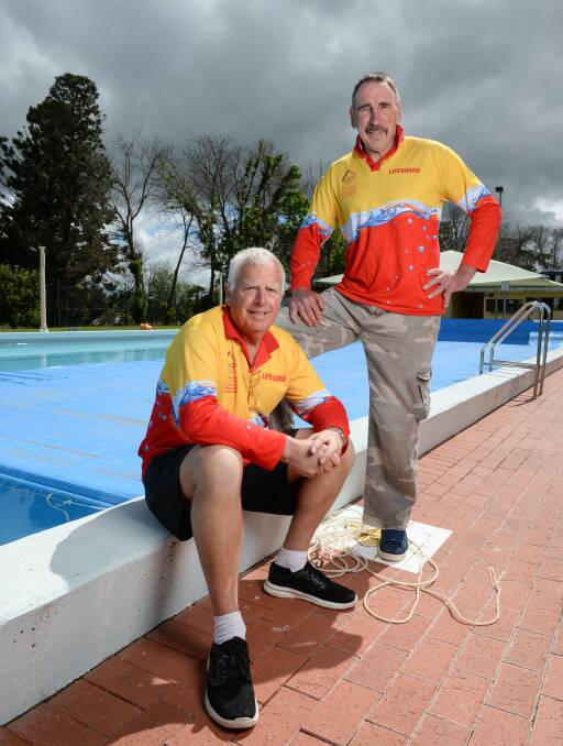 BONUS: Rutherglen pool lifeguards Ray Terrill and Jim Bell have been working to maintain the facility in the off season, for a trial of extended hours. Picture: MARK JESSER