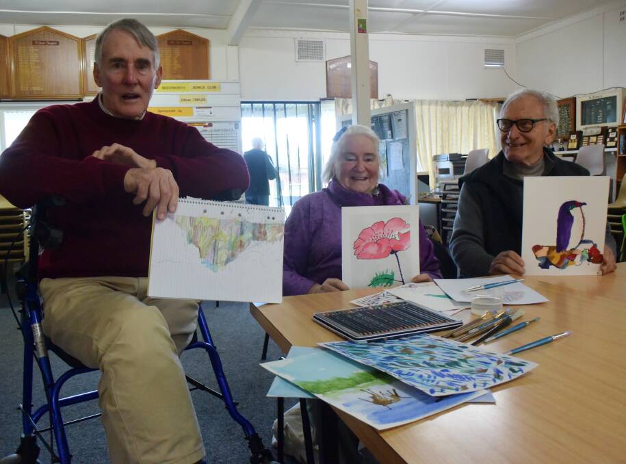 ARTISTS: Mark Everingham, Maree Goodings and Bill Hoebert have been participating in the Cafe Connections program in Beechworth for people affected by memory loss.