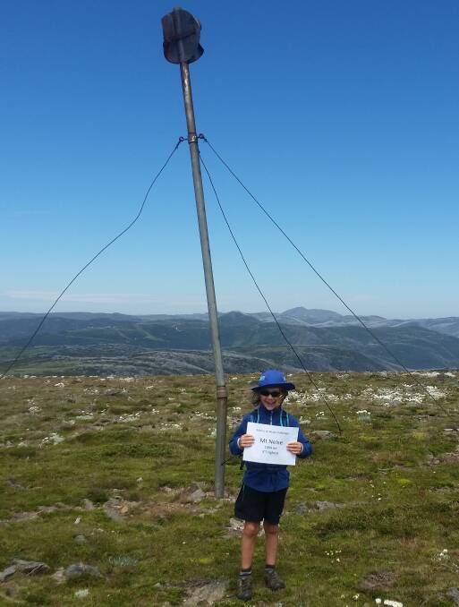 ON A MISSION: Mack Hull, 7, is climbing Victoria's 10 highest peaks to raise money for Disabled Wintersports Australia. The Mt Beauty boy is pictured here at Mt Nelse.