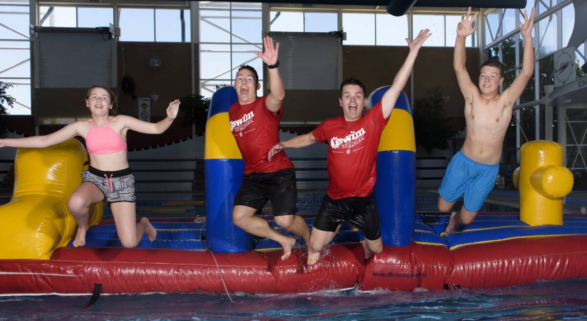 MAKE A SPLASH: Matt and Ryan test out Sunday's attractions with Catholic College Wodonga students Erin Matassoni and Ben Harvey, both 14.