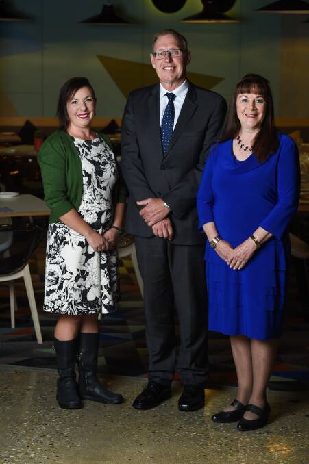  SUCCESS: Border Trust chairman Michael Salter has granted a Border Trust grant to the domestic violence project run by Albury community health's Kelley Latta and Zonta Club of Albury Wodonga president Joanne Metzger. Picture: MARK JESSER