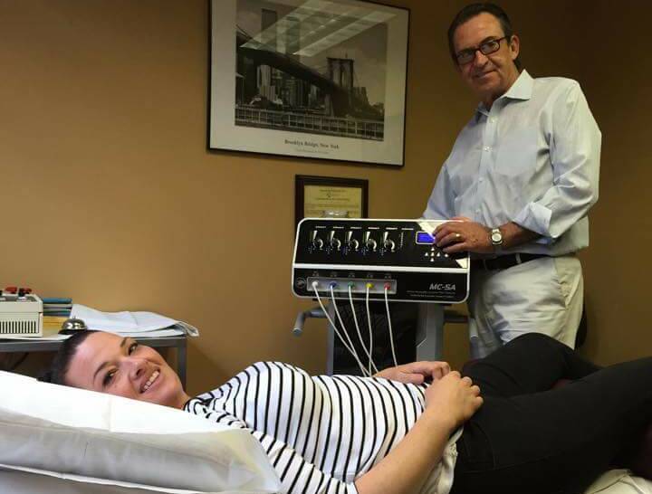 LIFE-CHANGING: Michelle Platschinda, who was left wheelchair-bound by her complex regional pain syndrome, regained the ability to walk after receiving calmare therapy in America with Michael Cooney.
