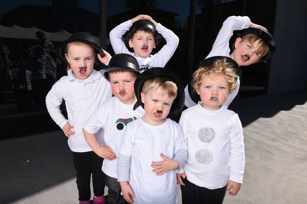 Kate Woods, 4, Jim Willis, 2, Cobi Spencer, 4, Lonnie Stein, 2, Josh Skryczak, 2, and Cooper Skryczak, 4, channel Charlie Chaplin ahead of a world record attempt for the most Chaplin look-alikes in Albury in October. Picture: MARK JESSER