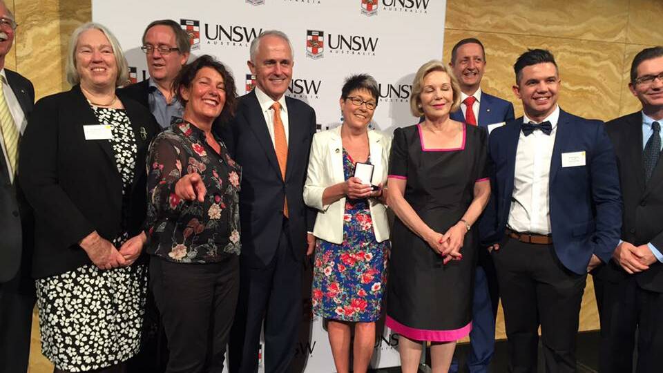 Annette Baker with Prime Minister Malcolm Turnbull at the presentation of the Australian Mental Health Prize. Picture: Heath Harrison