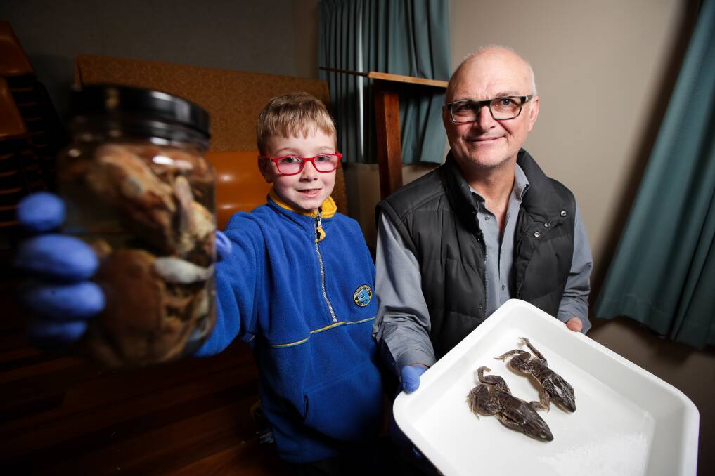THEY NEED US: Toby Maurer, 8, from Temora enjoyed hearing about frogs and 'why we need them' at Chiltern from Dr John Rafferty from Charles Sturt University. Picture: JAMES WILTSHIRE