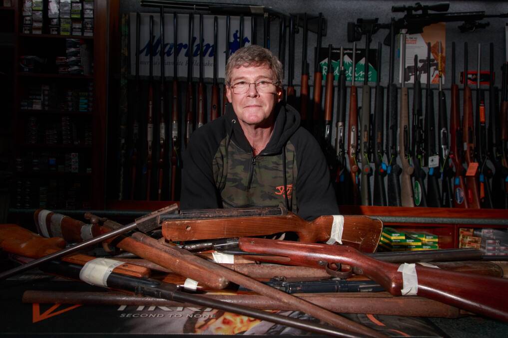 OPPORTUNITY: About 200 firearms have been handed in to Bluey's Hunting and Fishing in Wodonga during the national amnesty and Rob Williams hopes more will be surrendered before it ends. Picture: SIMON BAYLISS 