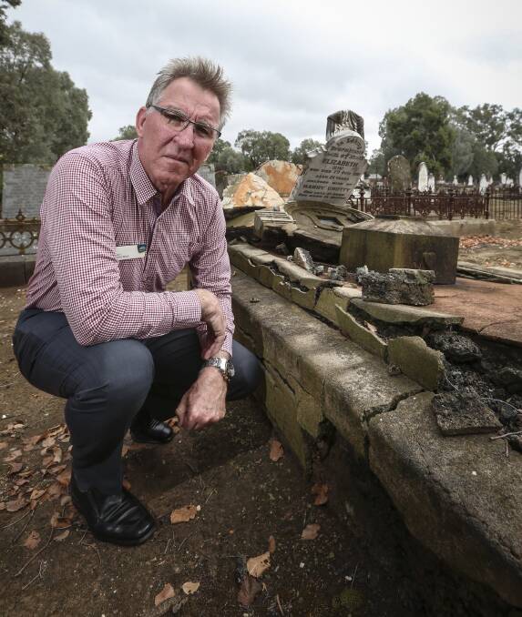 DISGUSTED: Albury Mayor Kevin Mack says council will look into security measures at Pioneer Cemetery after nine headstones were smashed. Picture: JAMES WILTSHIRE