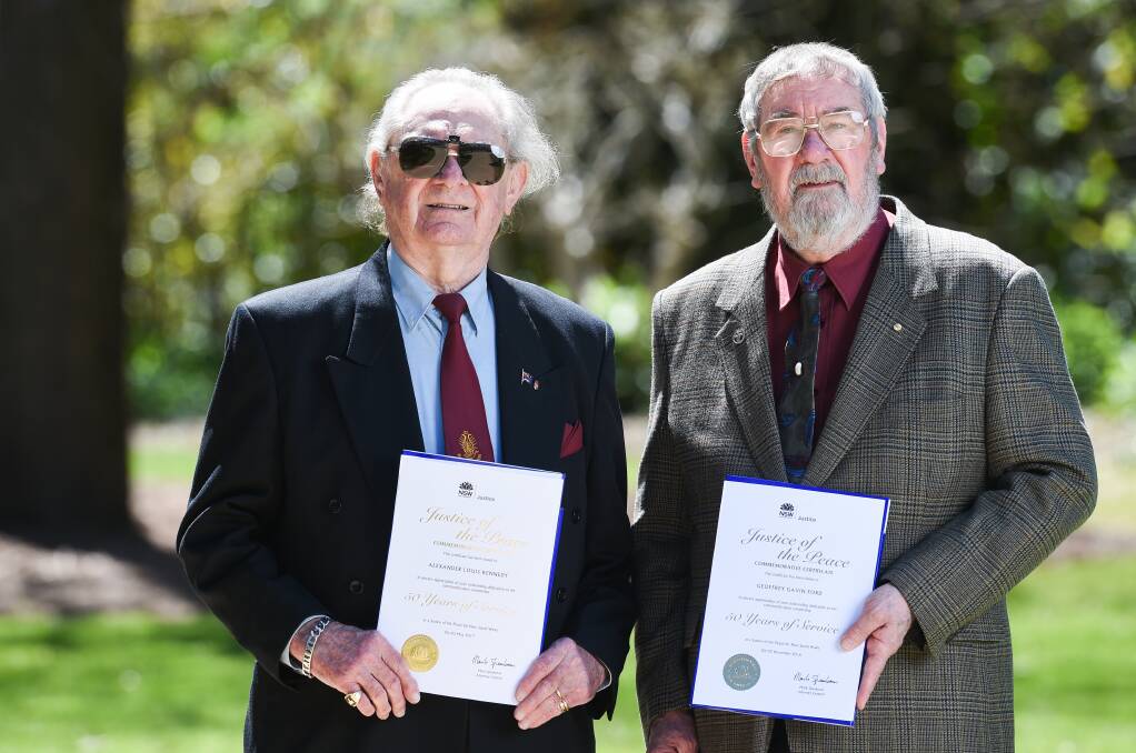LONG-SERVING: Alex Kennedy of Albury and Geoff Ford of Holbrook have been recognised for their 50 years of service as Justices of the Peace. Picture: MARK JESSER