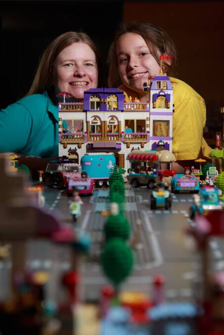 READY TO GO: Amanda and Celeste Dakos and the Albury Wodonga Lego User Group team have been hard at work preparing their exhibition. Picture: SIMON BAYLISS