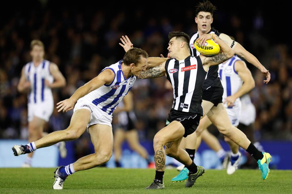 Highlights from the Collingwood Magpies and the North Melbourne Kangaroos game at Etihad Stadium on July 22, 2016 in Melbourne. Photos:  Michael Dodge/Getty Images, Michael Willson and Adam Trafford/AFL Media