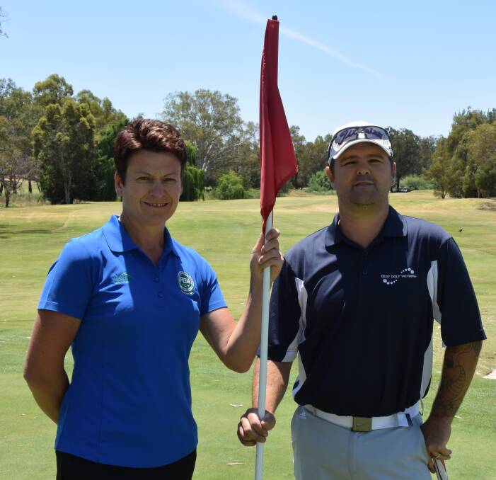 AIMING HIGH: Wodonga Golf Club pro Mandy Buchanan and deaf golfer Dean Connell. Connell is raising funds for the Victorian deaf squad to play at the Australian championships. Picture: CHRIS YOUNG