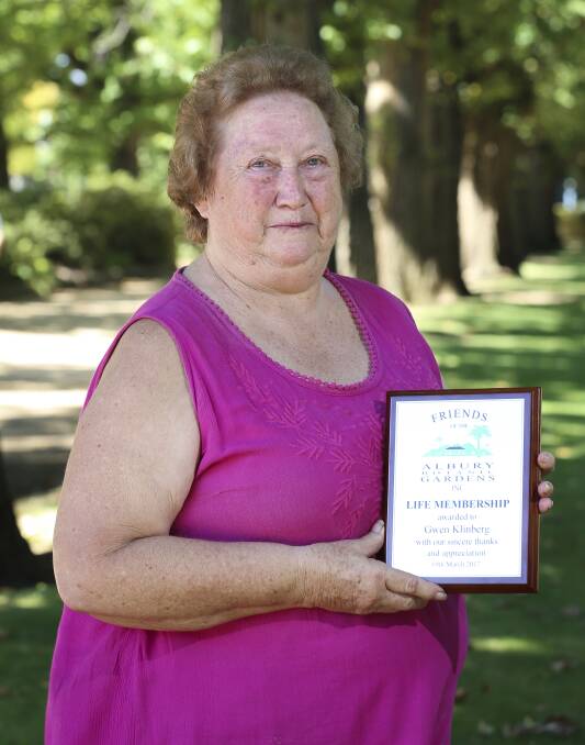 TWENTY OF THE BEST: Gwen Klinberg was made a life member of the Friends of the Albury Botanic Gardens in a surprise ceremony on Sunday. Pictures: JAMES WILTSHIRE