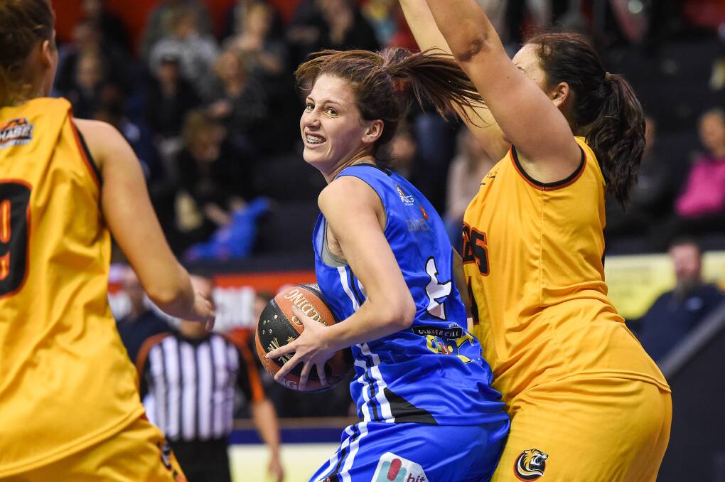 TOUGH ASK: Olivia Barber battled hard to secure an equal team-high seven rebounds against the Tigers on Saturday. Picture: MARK JESSER