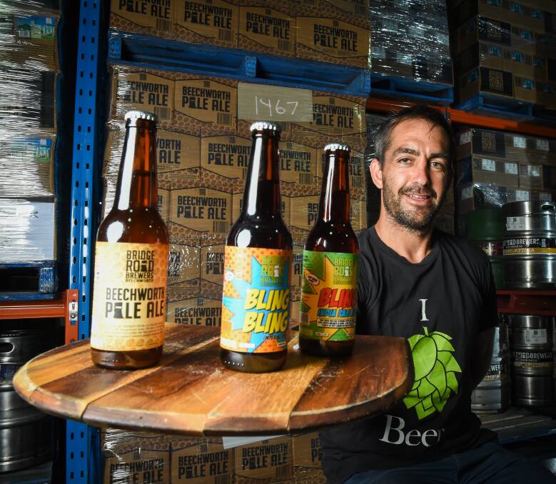 A FINE BREW: Bridge Road Brewery founder Ben Kraus with the three beers that made it onto the Hottest 100 Craft Beers of 2016 list. Picture: MARK JESSER
