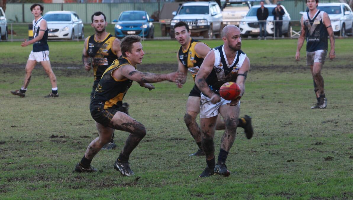 LEAD FROM THE FRONT: Mitta coach Simon Hillier led the Mountain Men to a stirring come from behind win over Barnawartha. Picture: CHRIS YOUNG