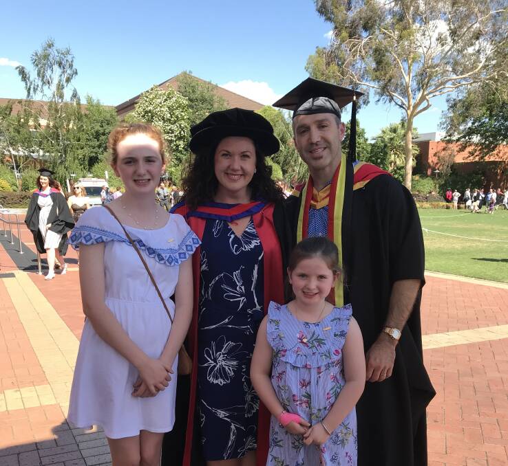 ACADEMICS: Dr Jessica Biles received her PhD from CSU on Friday afternoon, and had her daughters Stella and Audrey, and her husband Brett on hand to celebrate with her.