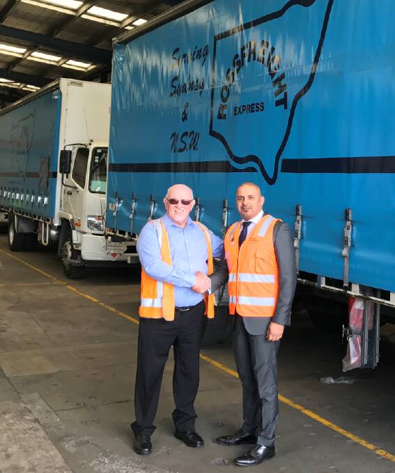 Border Express' Mostafa Kassaby with Rossfreight owner Ray Pershouse.