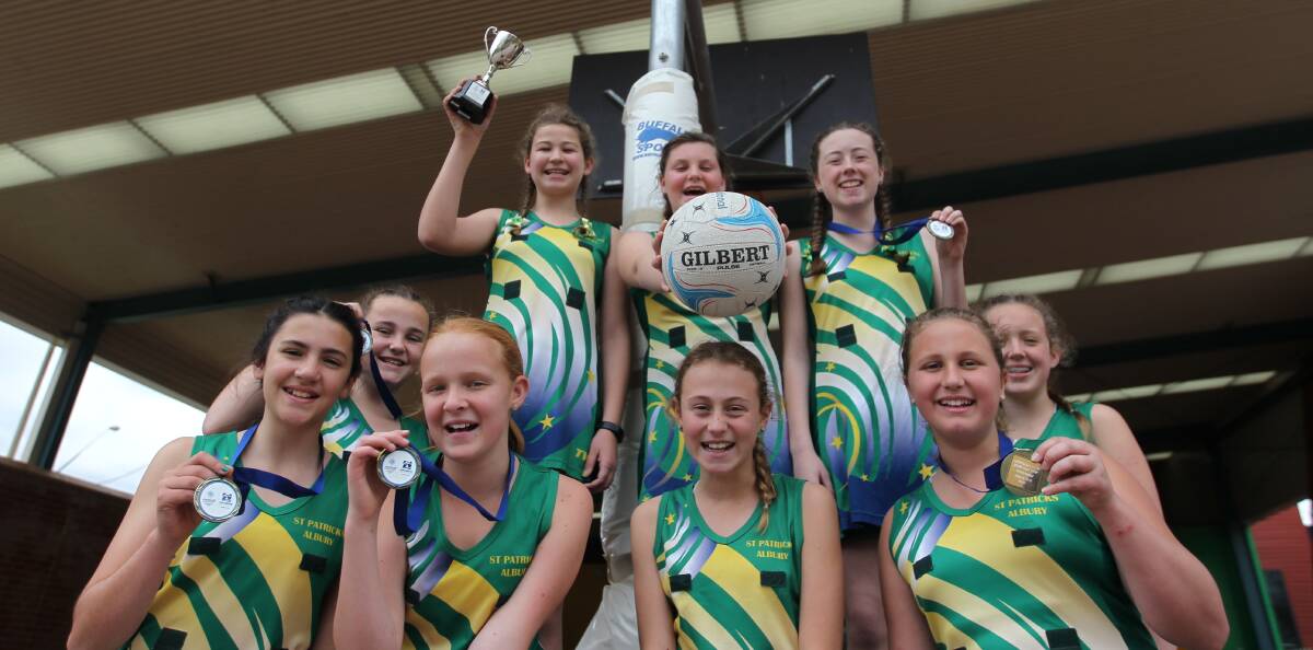 BOUNCE BACK: The grade five and six girls from St Pats rebounded from a grand final loss in 2015 to win the Netball NSW State Championship on Tuesday.