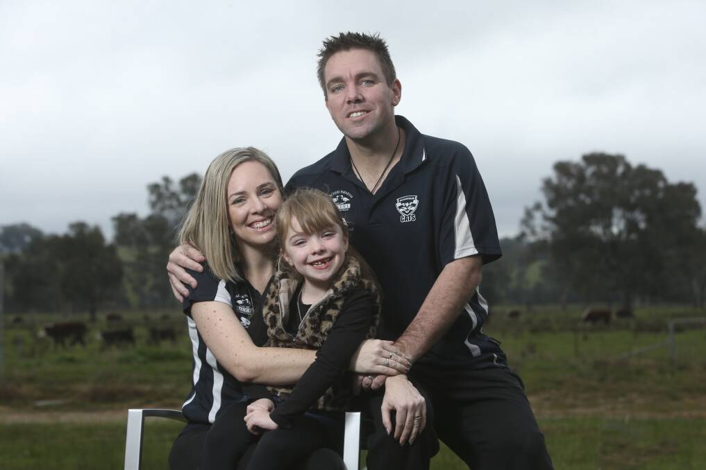 Karl Jacka, with his wife Cristy and daughter Lucy.