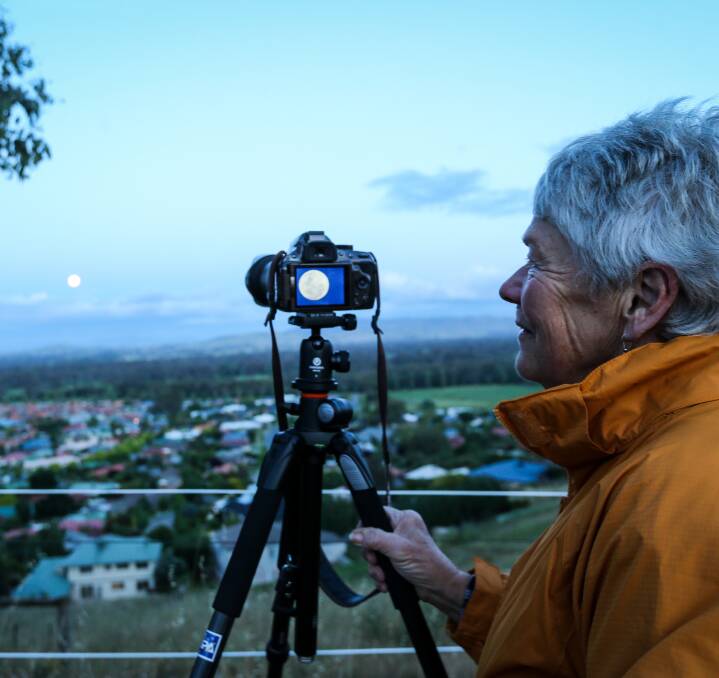 HAPPY SNAP: Marijke Korting from Lavington came up to take a photo of the moon. It has been 68 years since the moon orbited this close to Earth. Pictures: JAMES WILTSHIRE