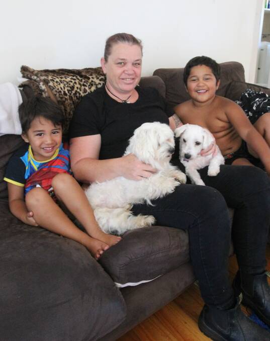 BACK HOME: Teressa Smith and kids TeArongi Moana and Tamati Hikurangi are glad their dogs Jasper and Billy are back home.