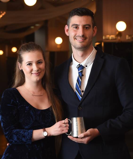 WINNER: Star Player Matt Park, with girlfriend Paige Smith,  said he was happy to win individual awards but would trade them both for a grand final win. Picture: MARK JESSER