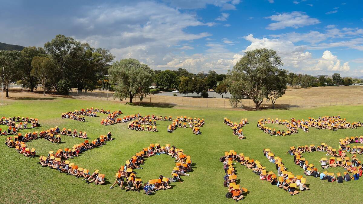 QUITE A SIGHT: Students at Murray High assembled on their oval to spell out the message that 'everyone belongs'. 