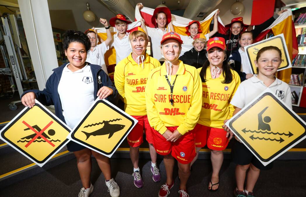 ON THE SHORE: Thurgoona Public students learned about beach safety from lifesavers Adrienne Howe, Nixy Krite and Rosie Taliano. Picture: JAMES WILTSHIRE