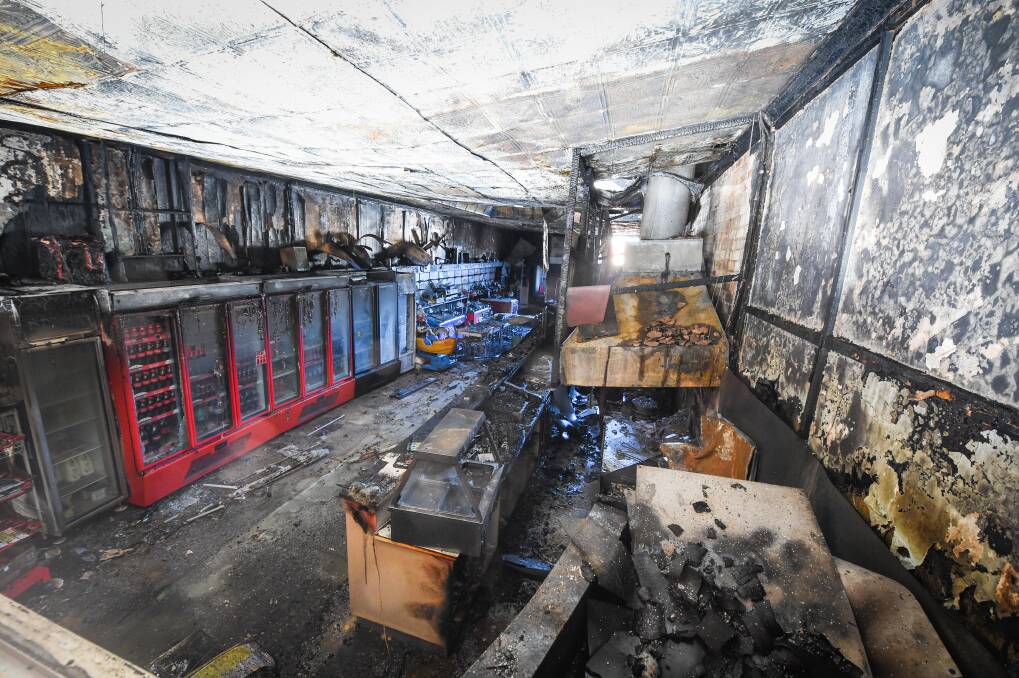 SAD DEMISE: Fire ripped through the Silver Key Cafe on Rutherglen's Main Street on Sunday night, leaving the community in shock and sadness. Picture: MARK JESSER