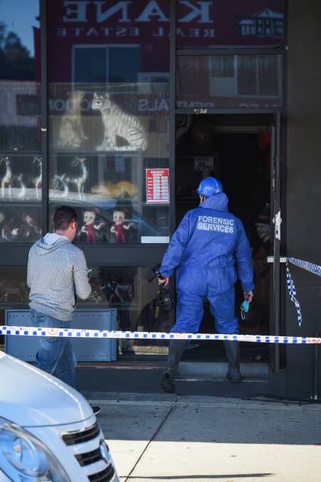 INVESTIGATION: Police are yet to confirm the cause of Saturday's fire at a Mate Street bric-a-brac store, but believe it was due to an electrical fault. Picture: MARK JESSER