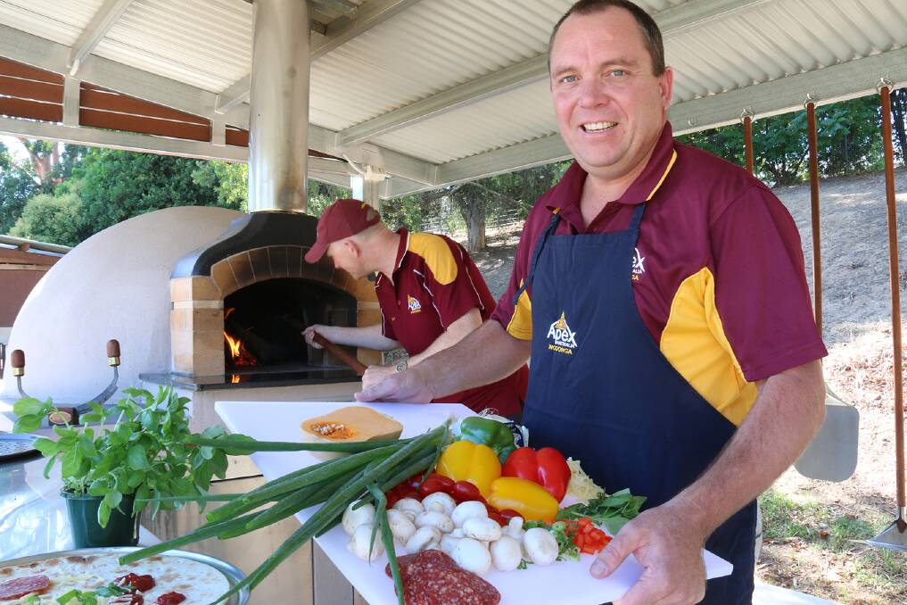 UP AND RUNNING: Apex Club of Wodonga fired up the Belvoir Park community pizza oven.