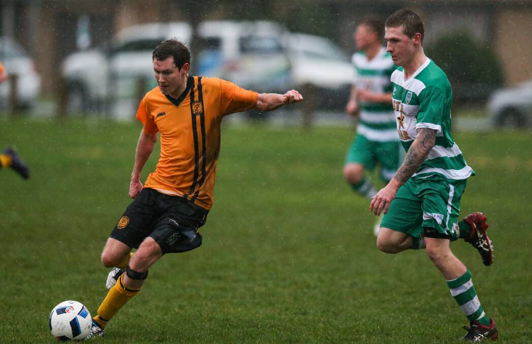 DOWNPOUR: The Hotspurs-Albury United match was moved to Jelbart Park, but it didn't stop the rain saturating James Eggleston. Picture: MARK JESSER