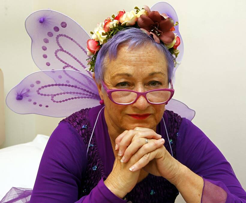 HEALER: Behind the fairy wings and coloured hair is an experienced health professional who is equally at home in an emergency department or up in the air with the Royal Flying Doctor Service. Picture: Les Smith.