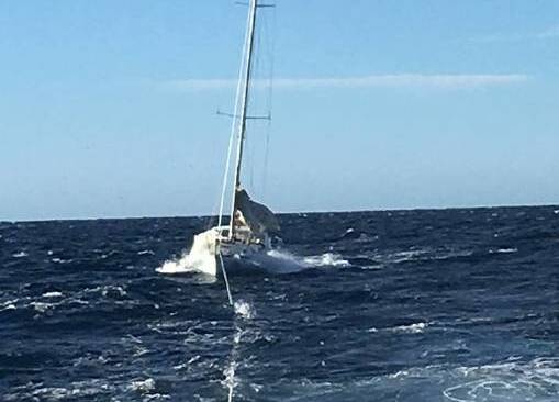 Bermagui Marine Rescue vessel BG30 towing the overdue yacht that was located abòut 20nm off Bermagui by radio direction finding equipment.
