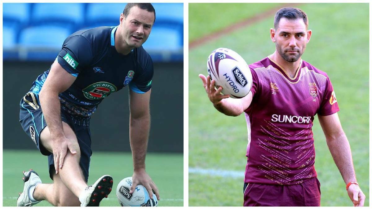 NSW Blues skipper Boyd Cordner and his Queensland opposite, Cameron Smith. Photos Getty Images.