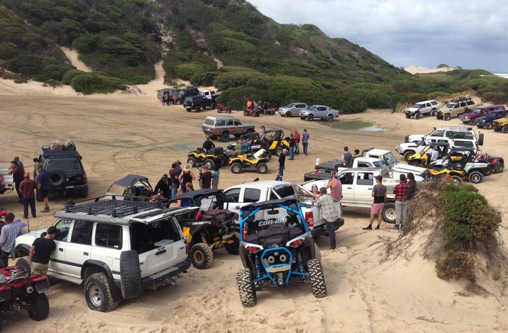DELAYS: Four-wheel drive vehicles and drivers stand on legal tracks on the West Coast to protest the delay in reopening Arthur-Pieman tracks.